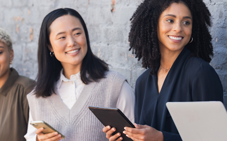 A group of people smiling.
