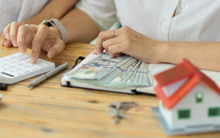 A person working on a tablet.