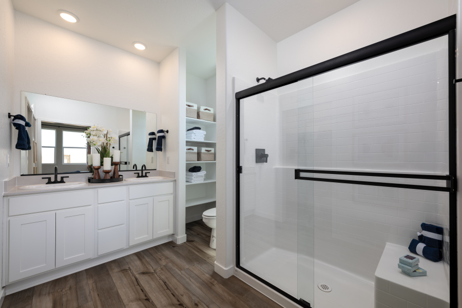 A bathroom with a glass shower.