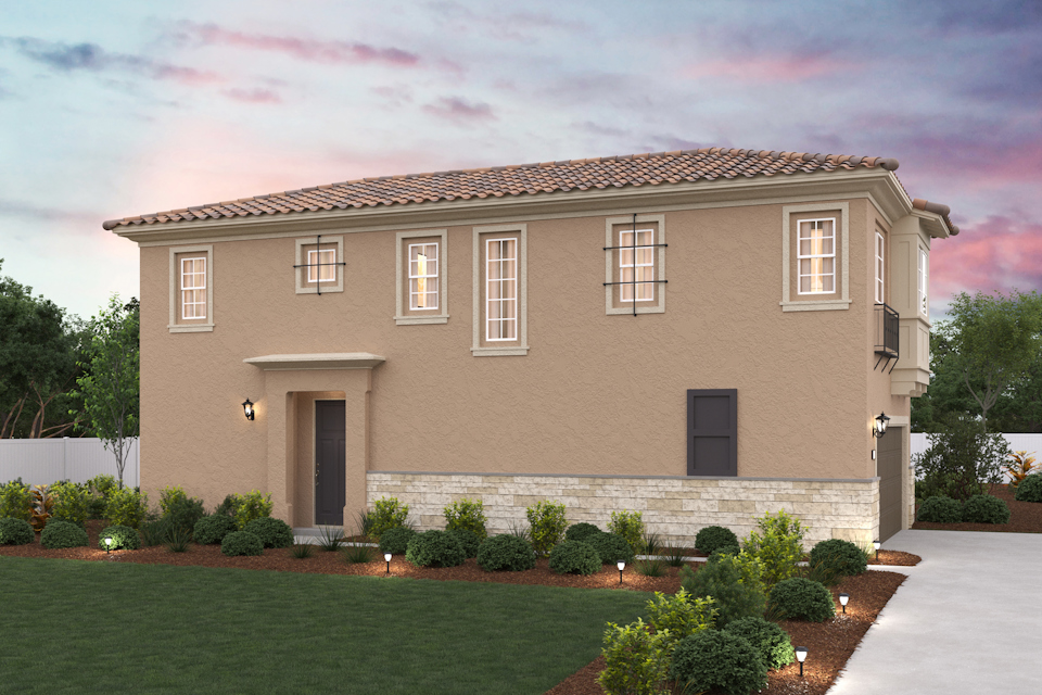 A house with a lawn and trees.