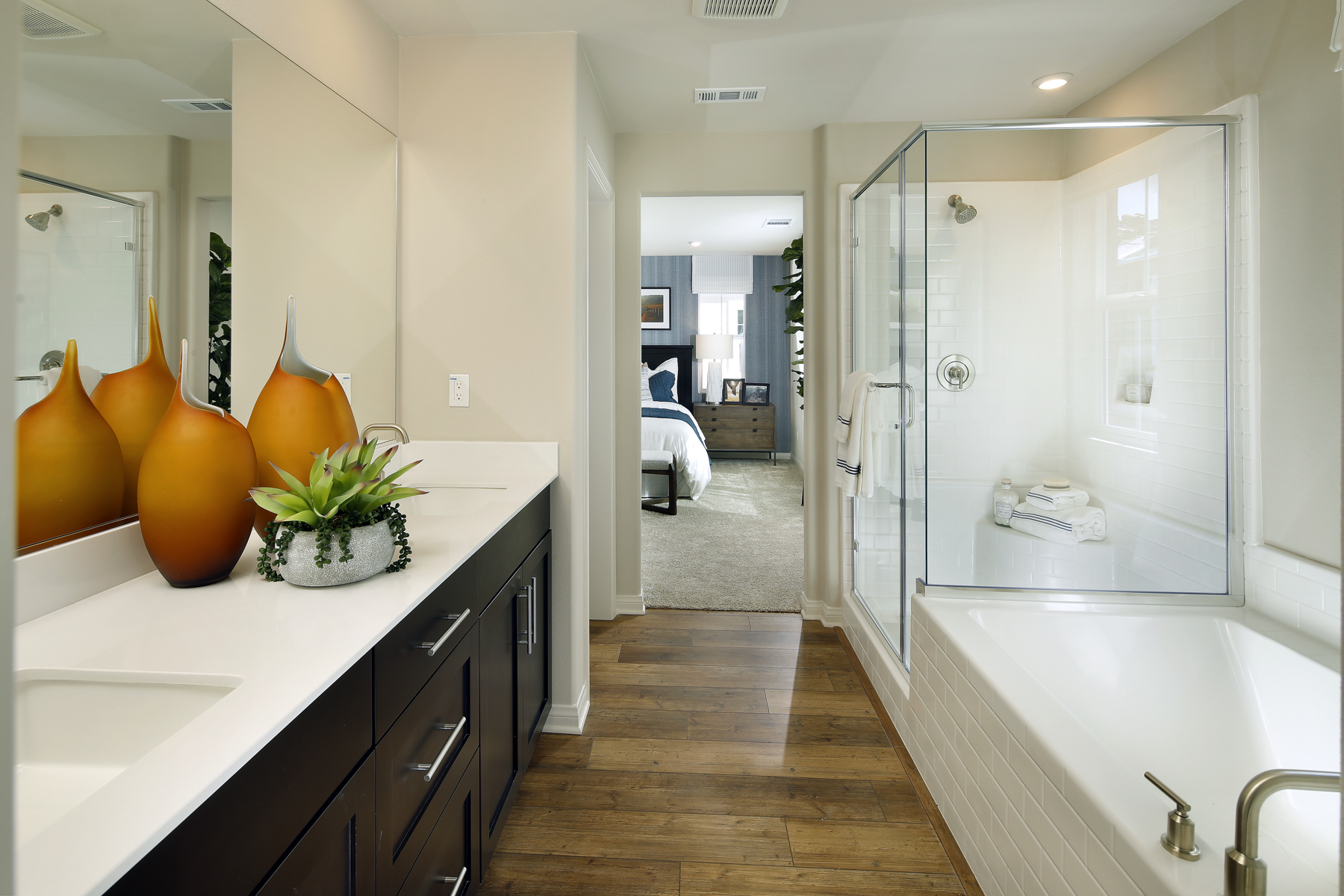 A bathroom with a tub and a sink.