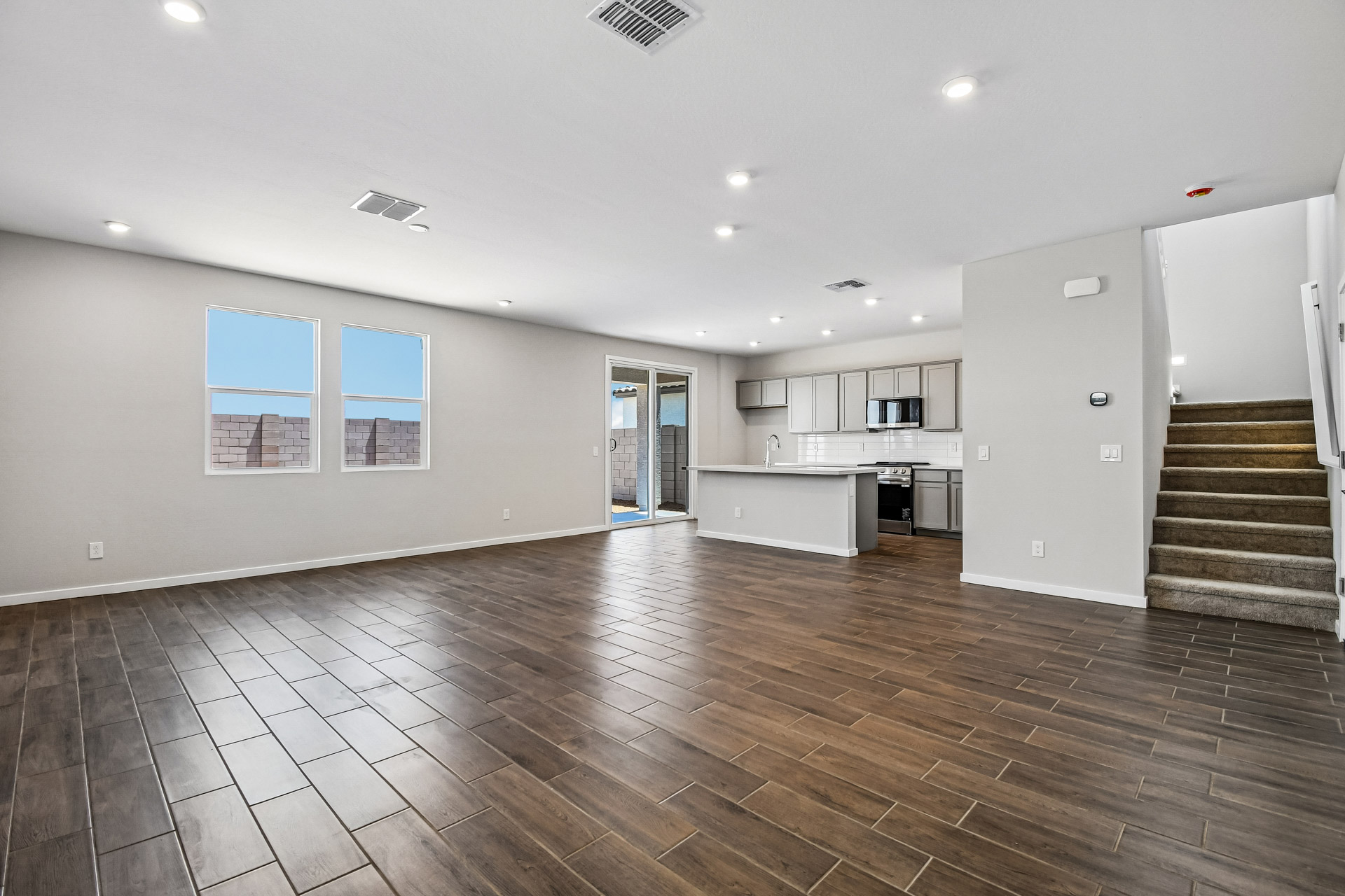 A large empty room with white walls.