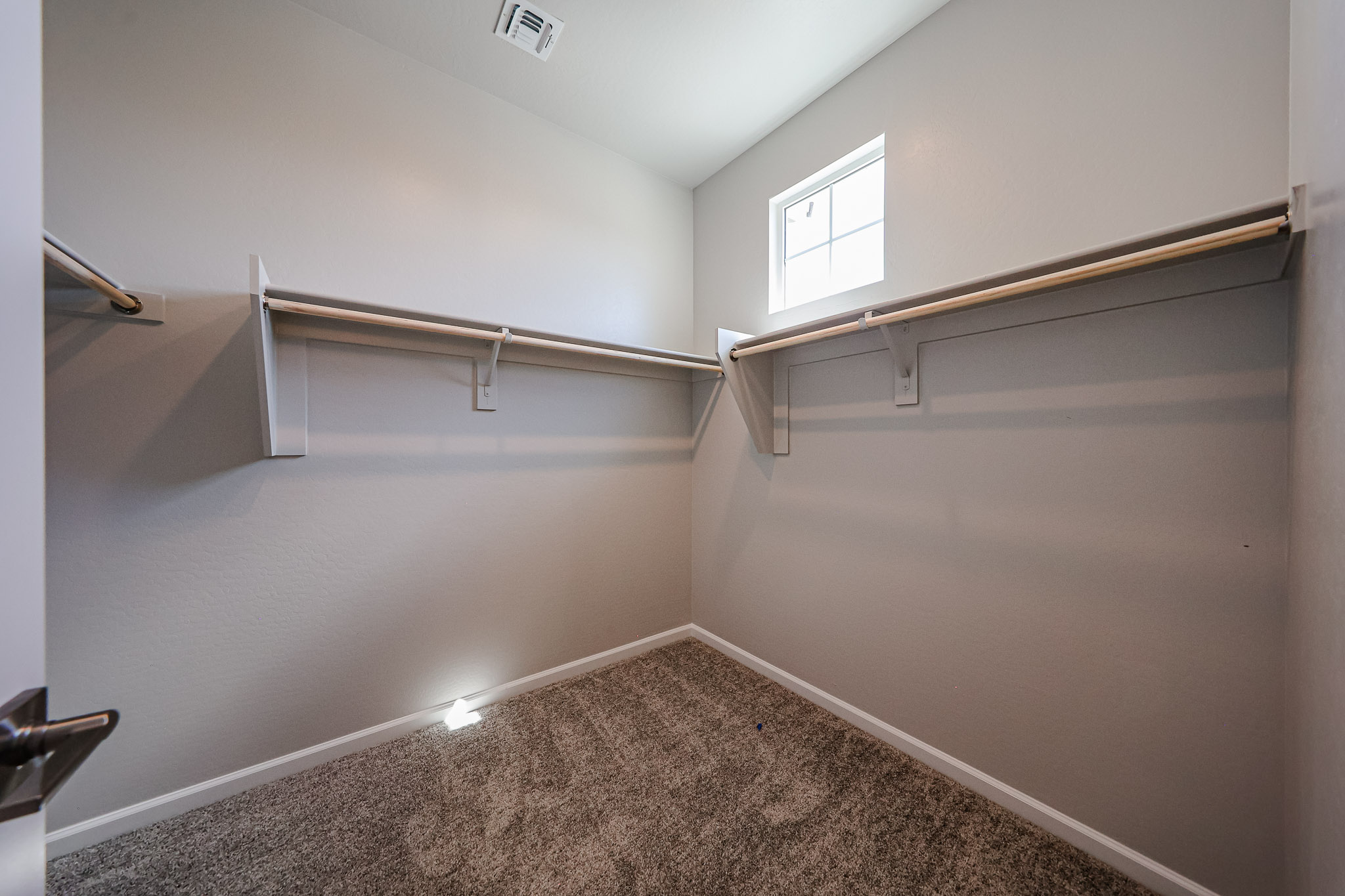 A room with a metal bar.