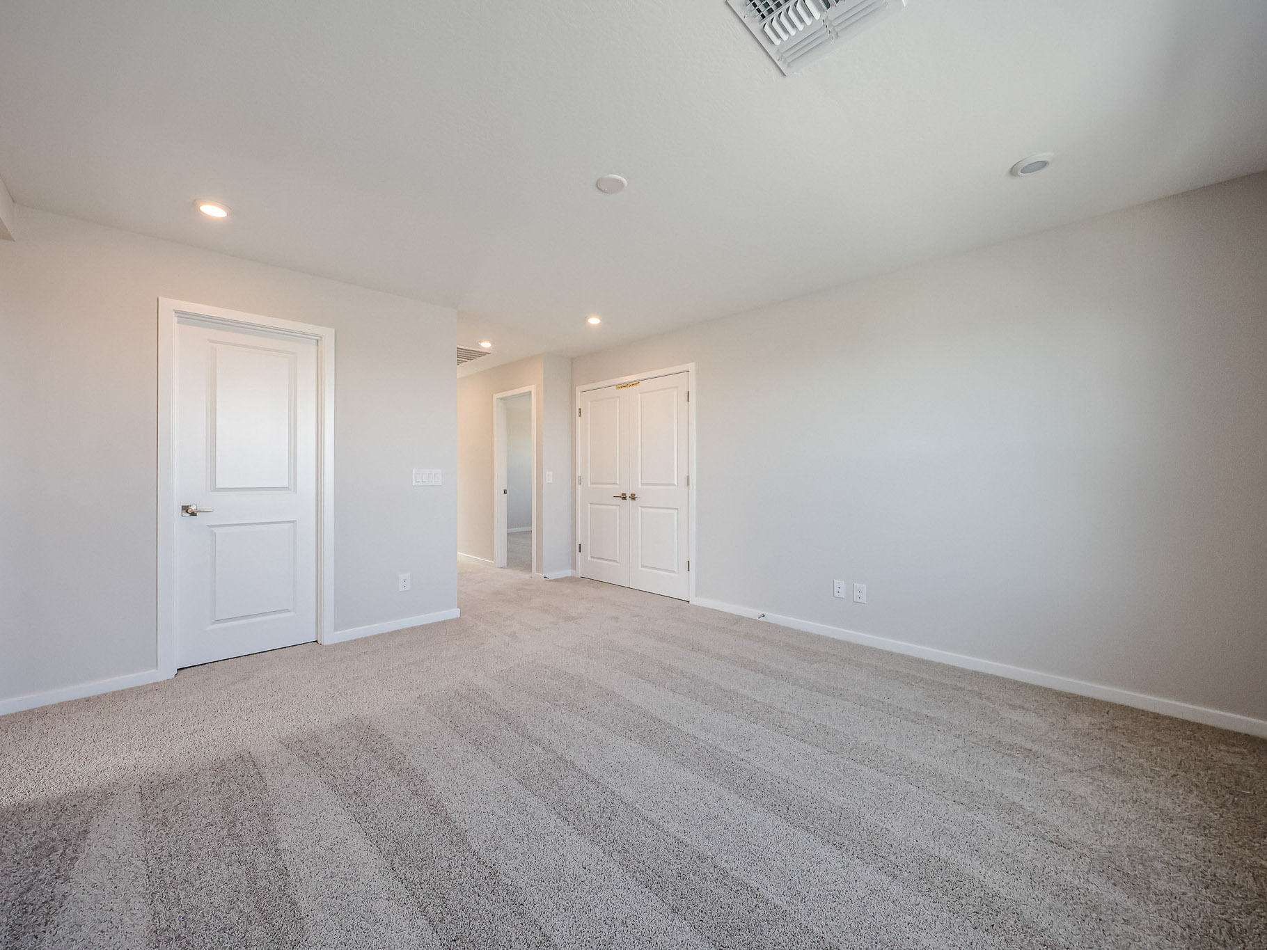 A room with white doors.