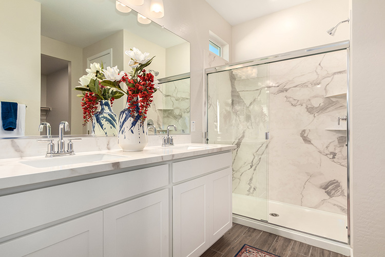 A bathroom with a glass shower.