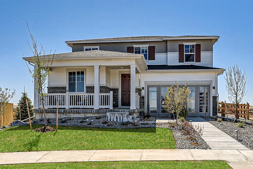 A house with a large front yard.