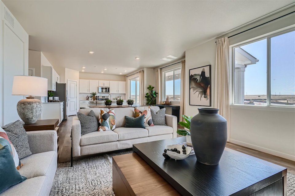 A living room with a couch and a coffee table.