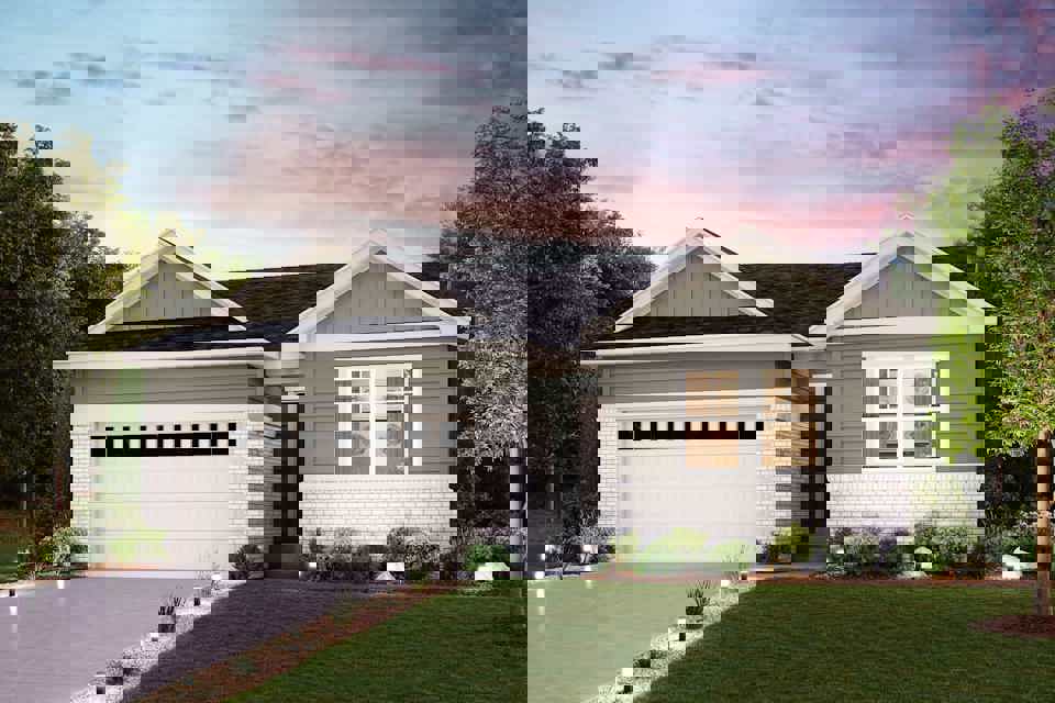 A house with a large front yard.