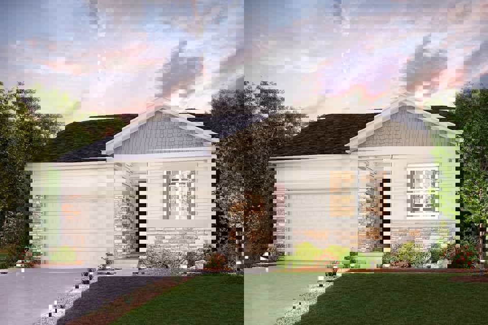 A house with a lawn and trees.