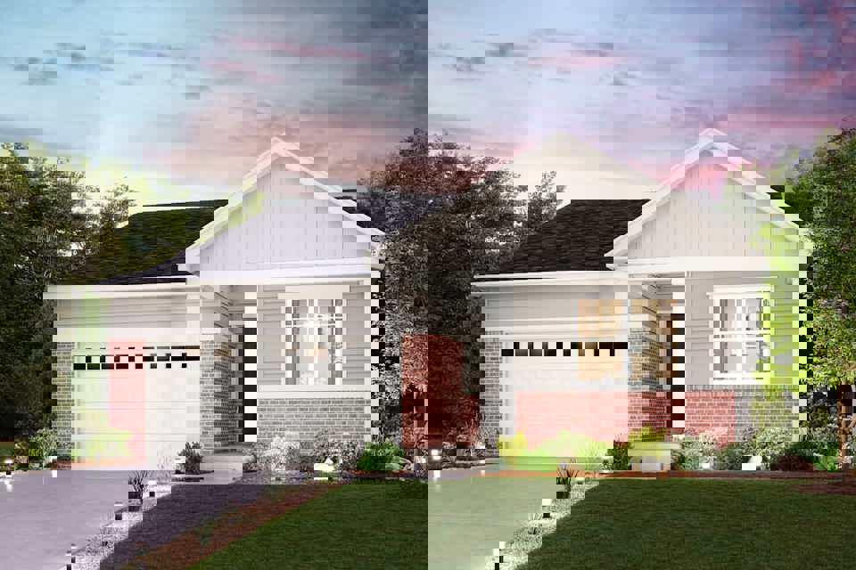 A house with a lawn and trees.