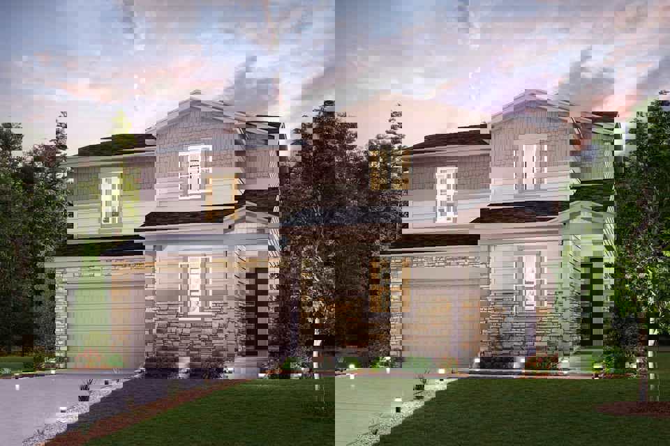 A house with a large front yard.