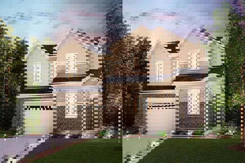 A large house with a driveway.