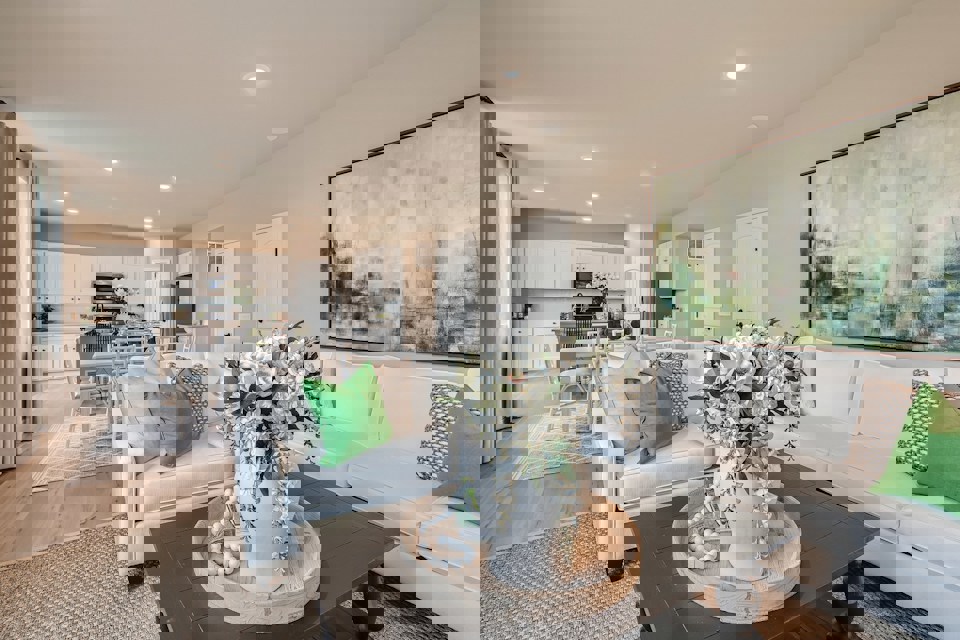 A living room with a couch and a coffee table.