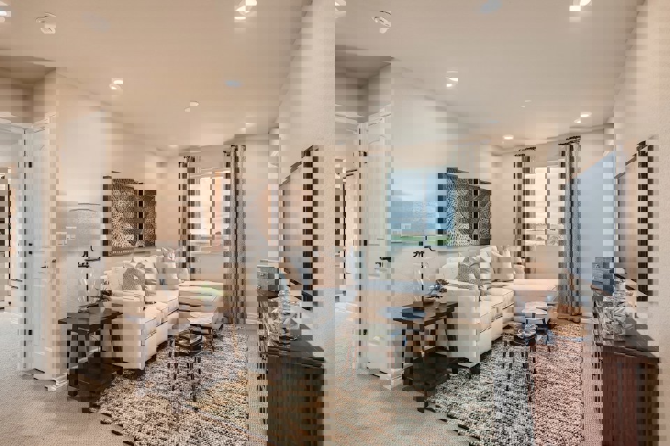 A living room with a large window.