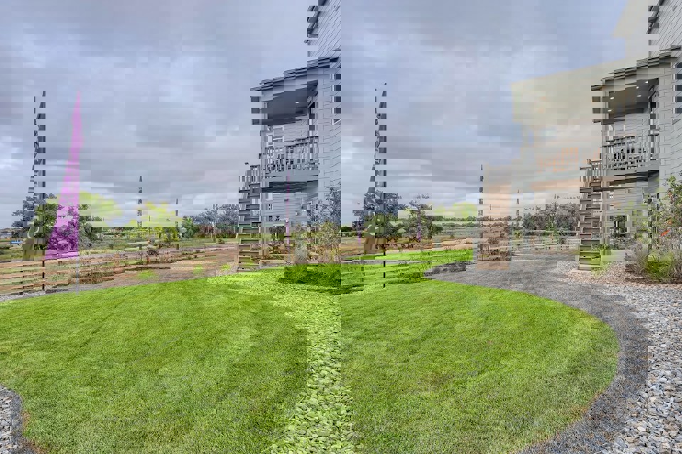 A grassy area next to a building.