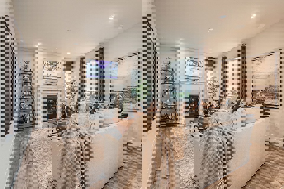 A living room with a fireplace.