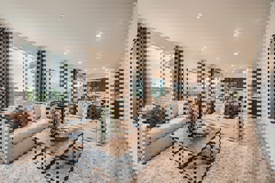 A living room with a large window.