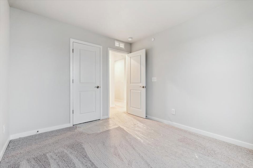 A room with white doors.