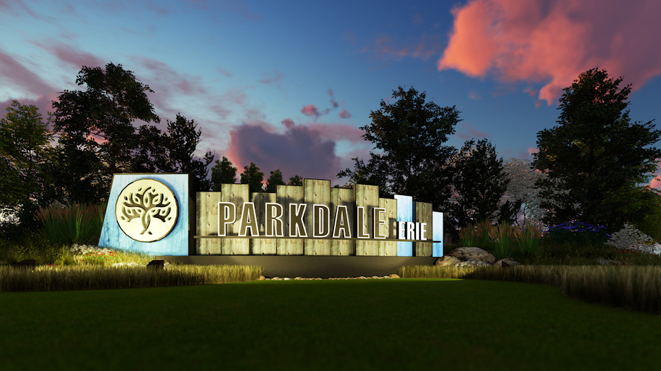 A sign in a grassy area.