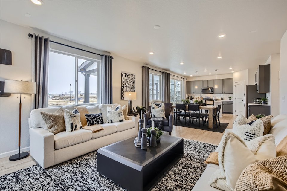 A living room with a large window.