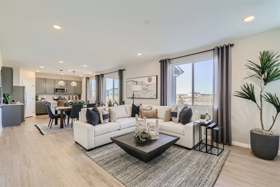 A living room with a large window.