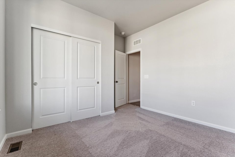 A room with white doors.