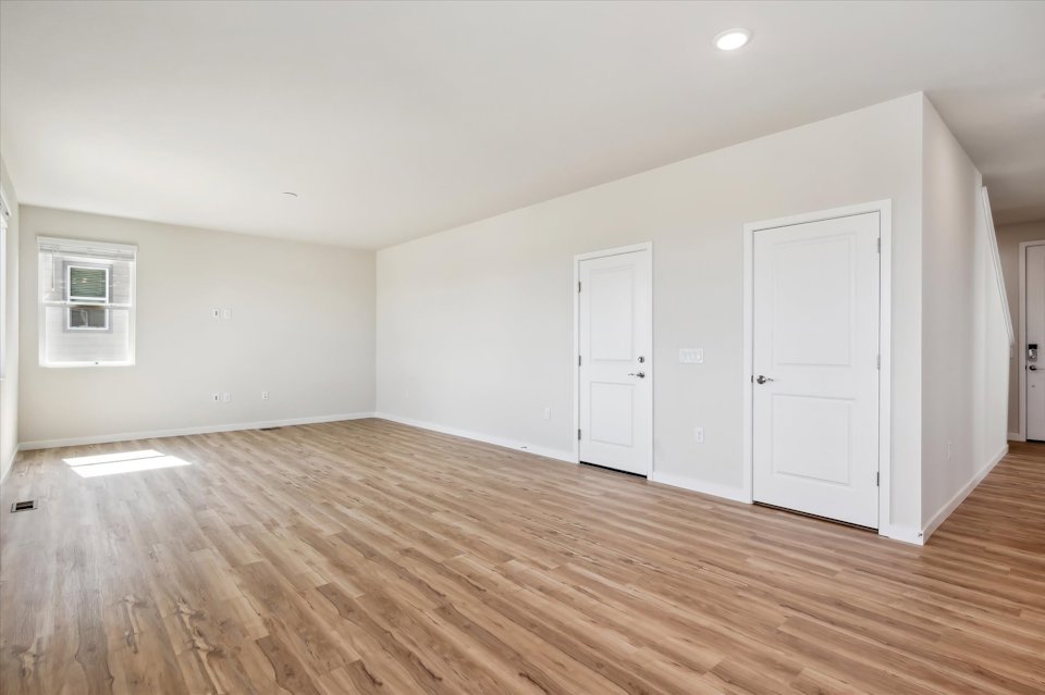 A room with white doors.