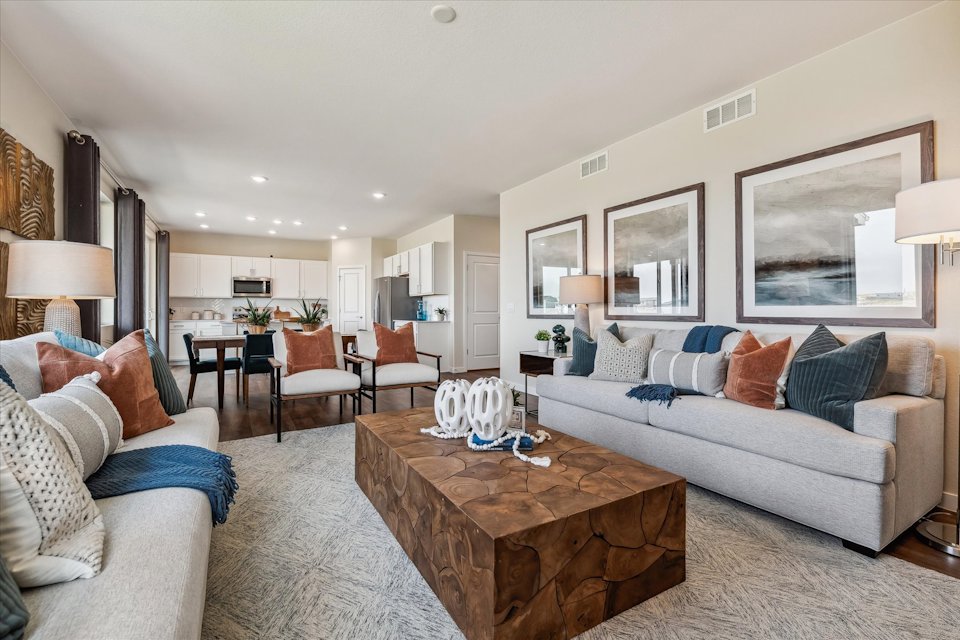 A living room with a couch and a coffee table.