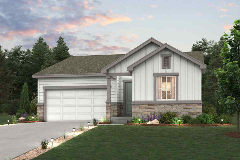 A house with a driveway and a lawn in front of it.