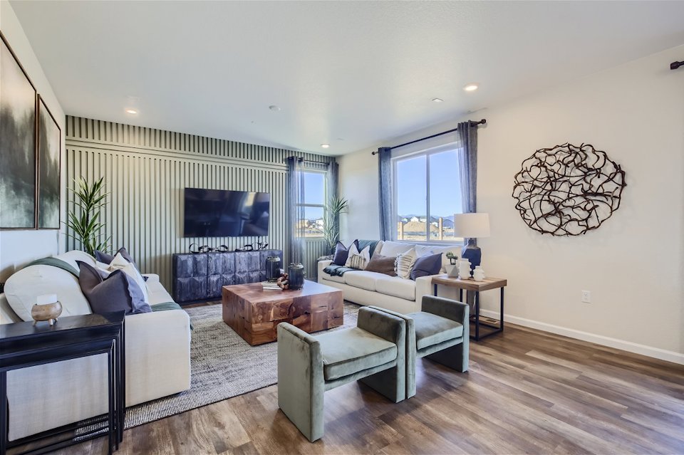 A living room with a fireplace.