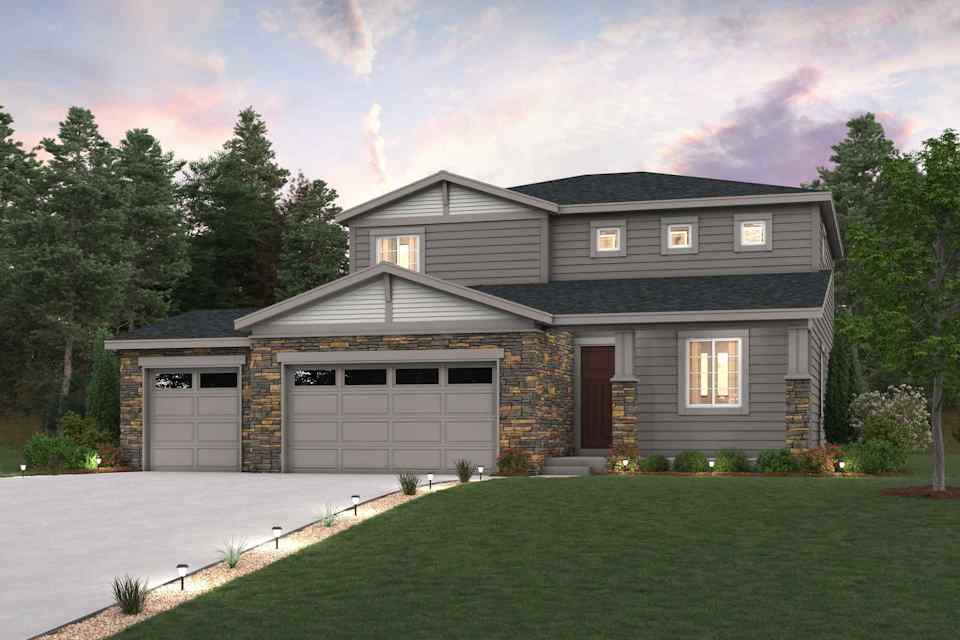 A house with a driveway and a large lawn in front of it.