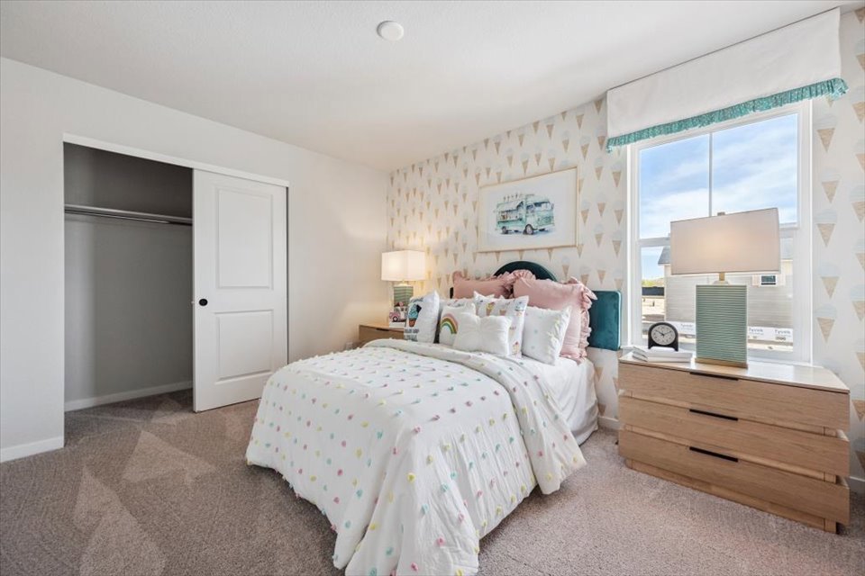 A person lying on a bed.