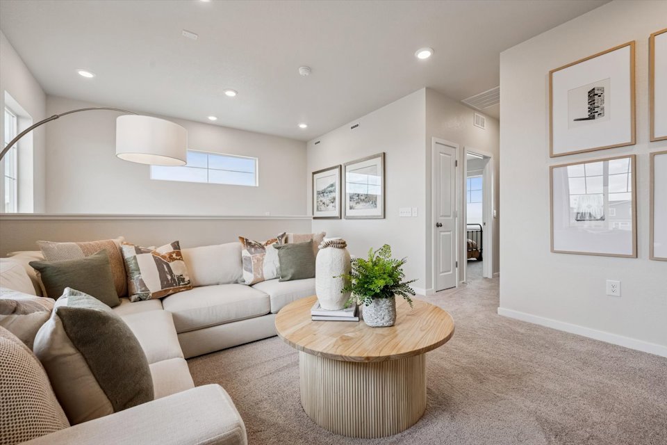 A living room with a couch and a coffee table.