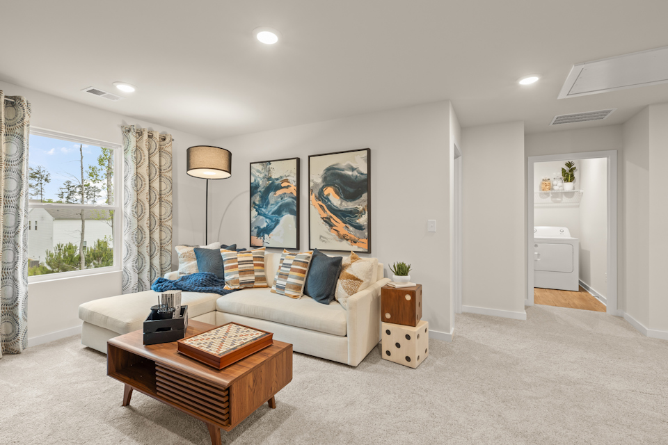 A living room with a couch and a coffee table.