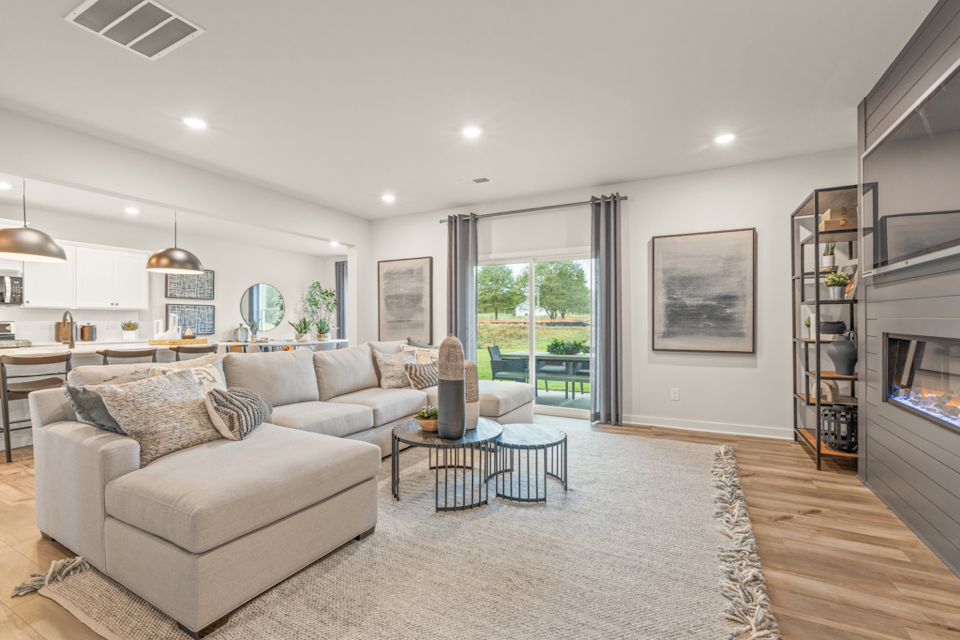 A living room with a large window.