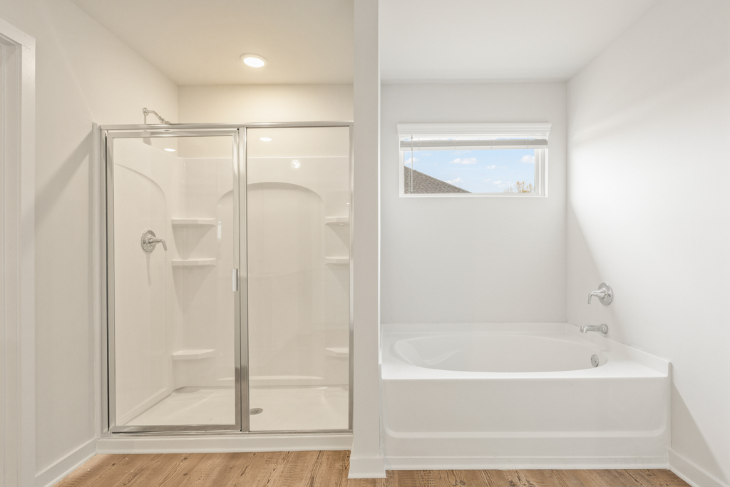 A bathroom with a glass shower.