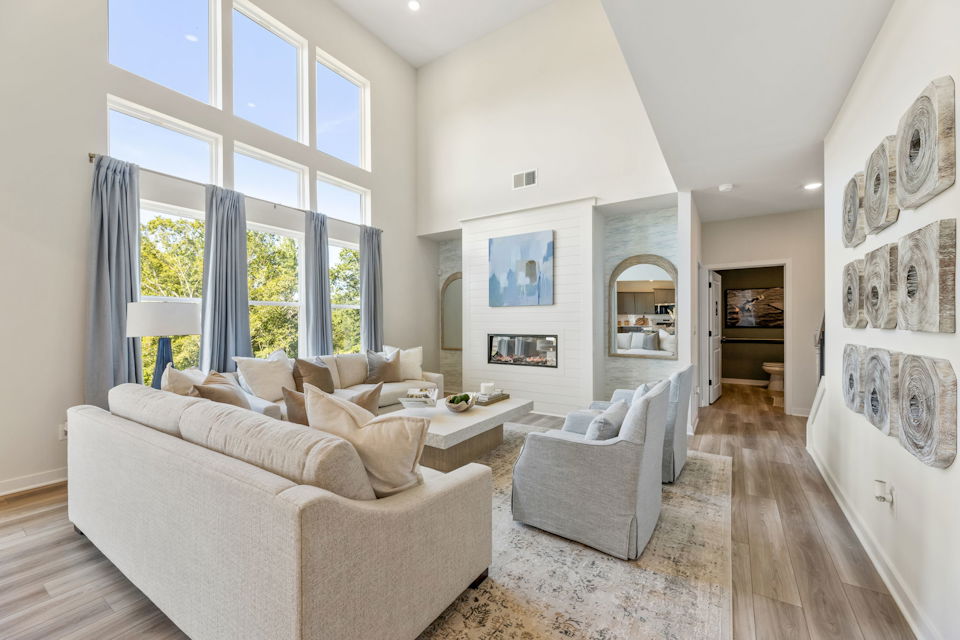 A living room with a large window.