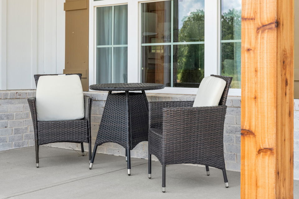 A table and chairs in a room.