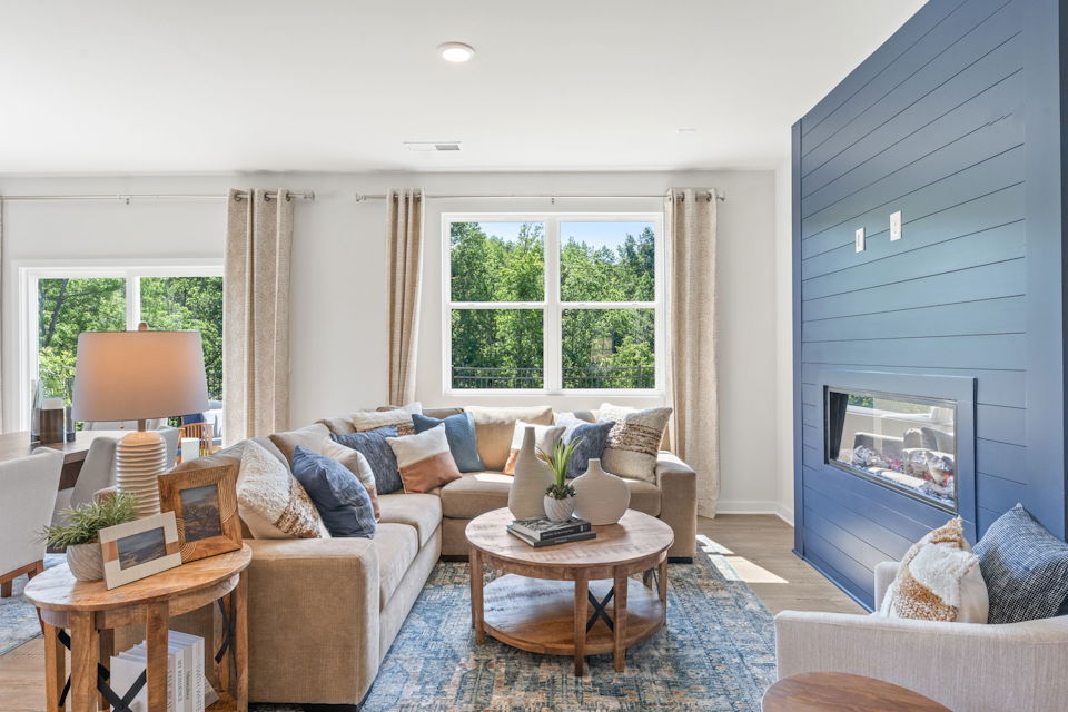 A living room with a couch and a coffee table.