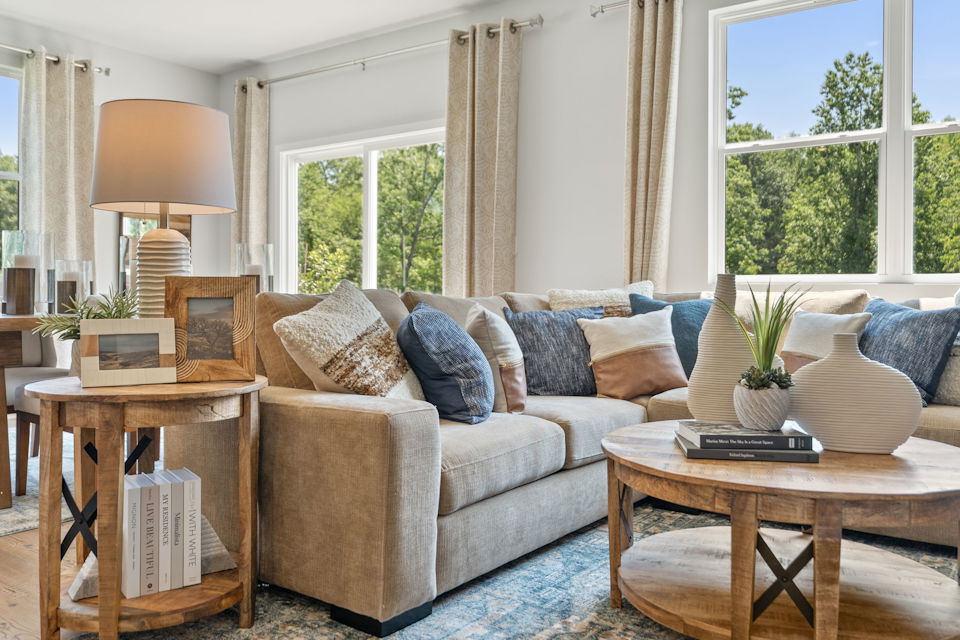 A living room with a couch and a coffee table.