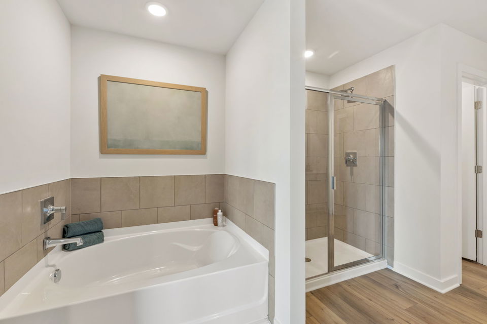 A bathroom with a glass shower.