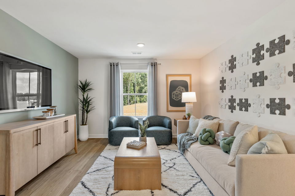 A living room with a couch and a coffee table.