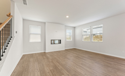 A room with a wood floor and a wood floor.