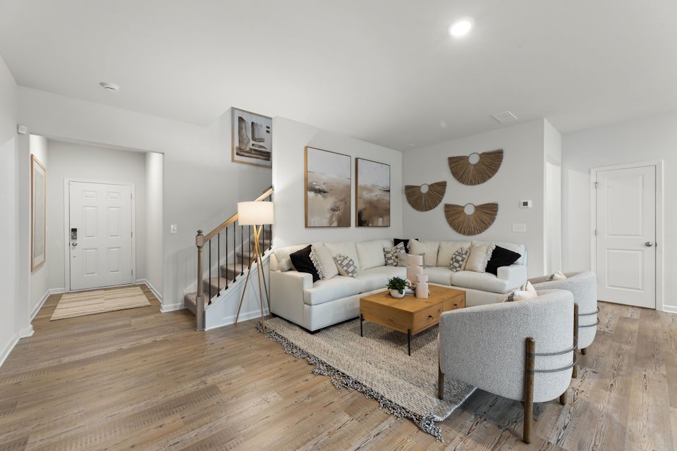 A living room with a couch and a coffee table.
