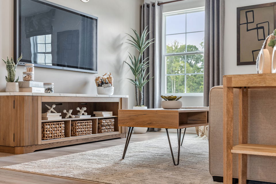 A room with a table and chairs.