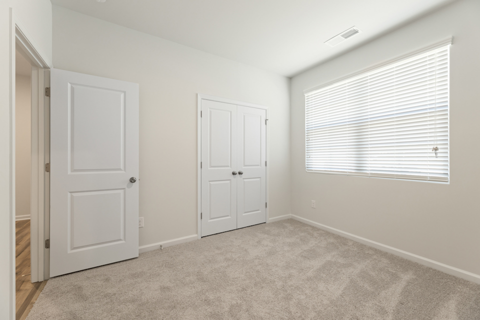 A room with white doors.