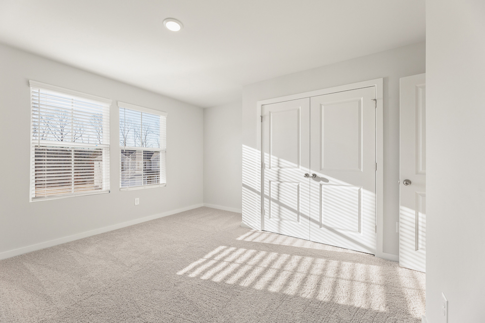 A room with white doors.