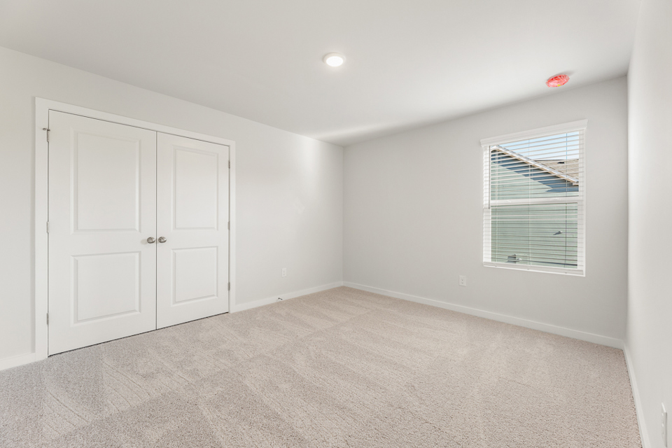 A room with white doors.