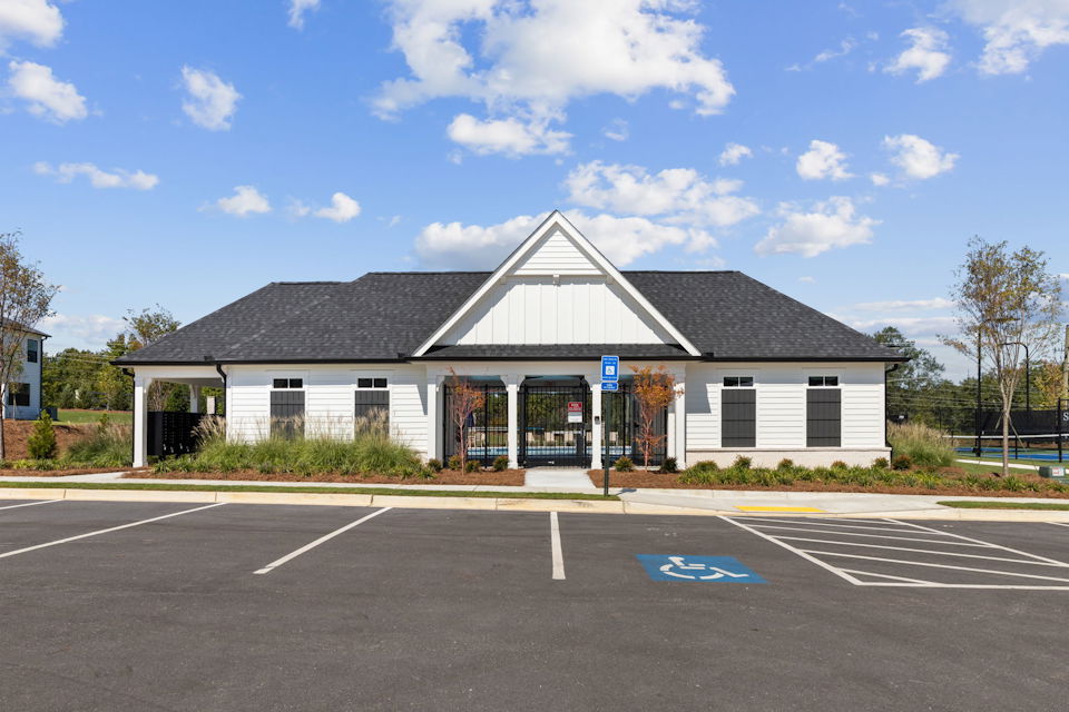 A building with a parking lot.