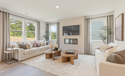 A living room with a large window.